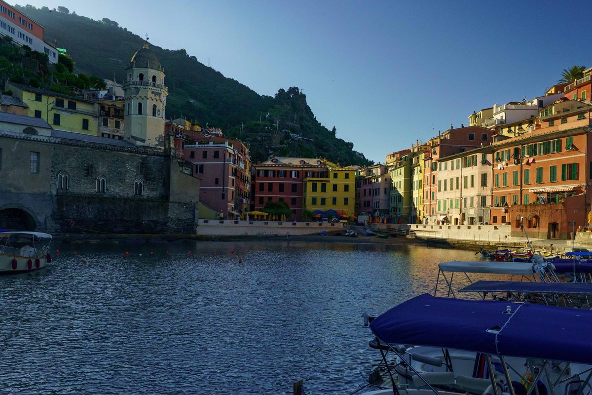 Golden hour light over the harbor in Vernazza