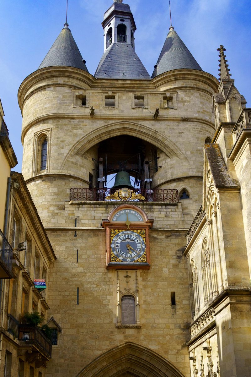 The Grosse Cloche belfry with its ornate clock and twin turrets in Bordeaux, France