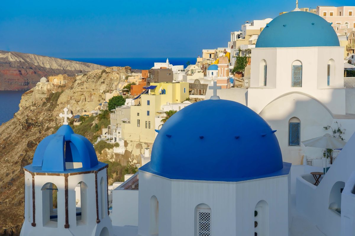 Blue-domed churches overlooking the caldera in Santorini