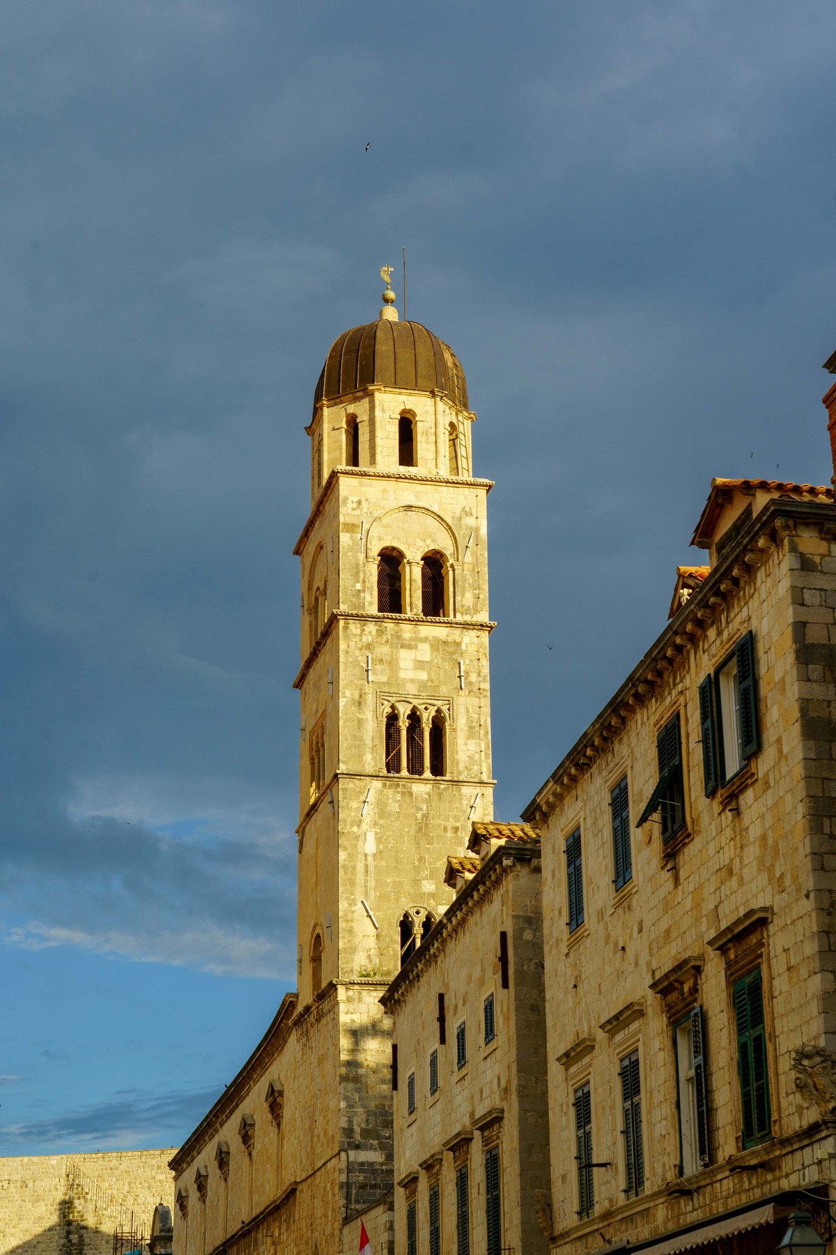 The bell tower keeping time over Dubrovnik's main street