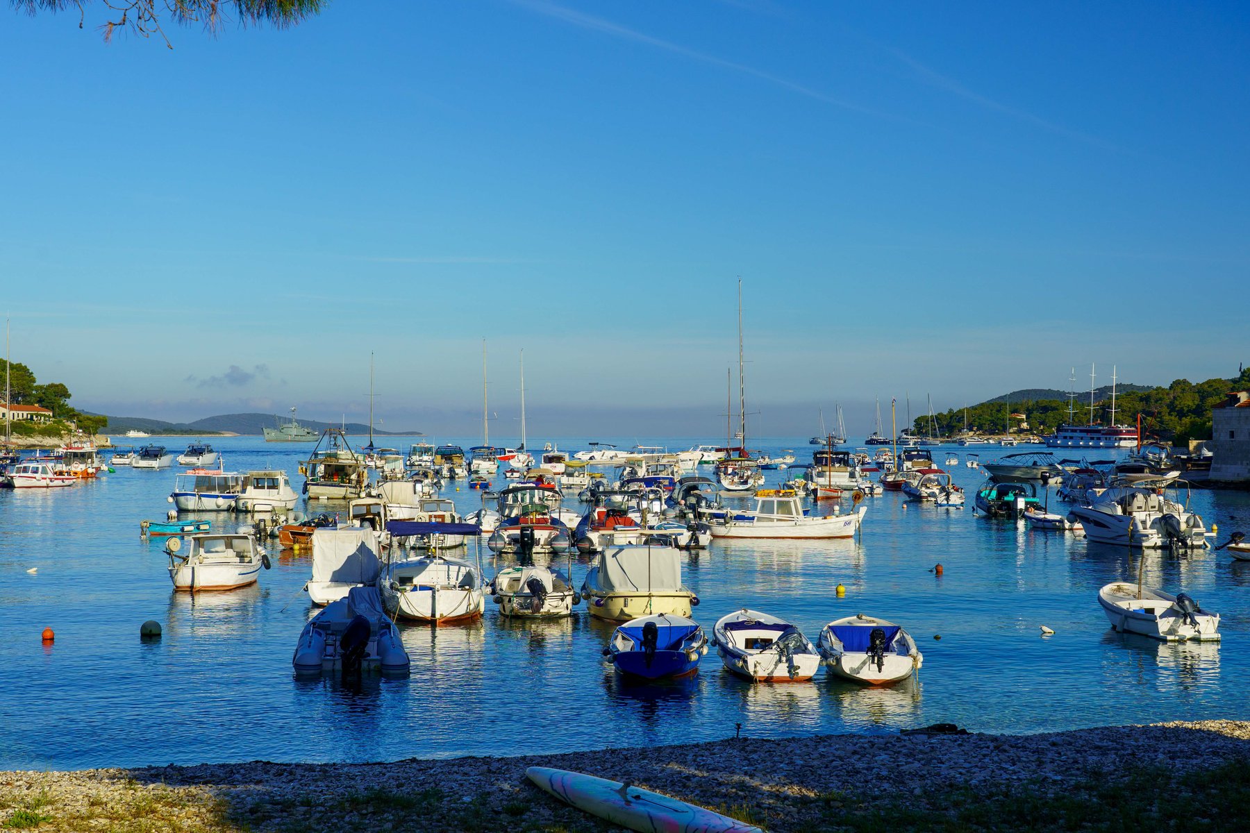 Hvar harbor at quiet sunrise before the crowds arrive