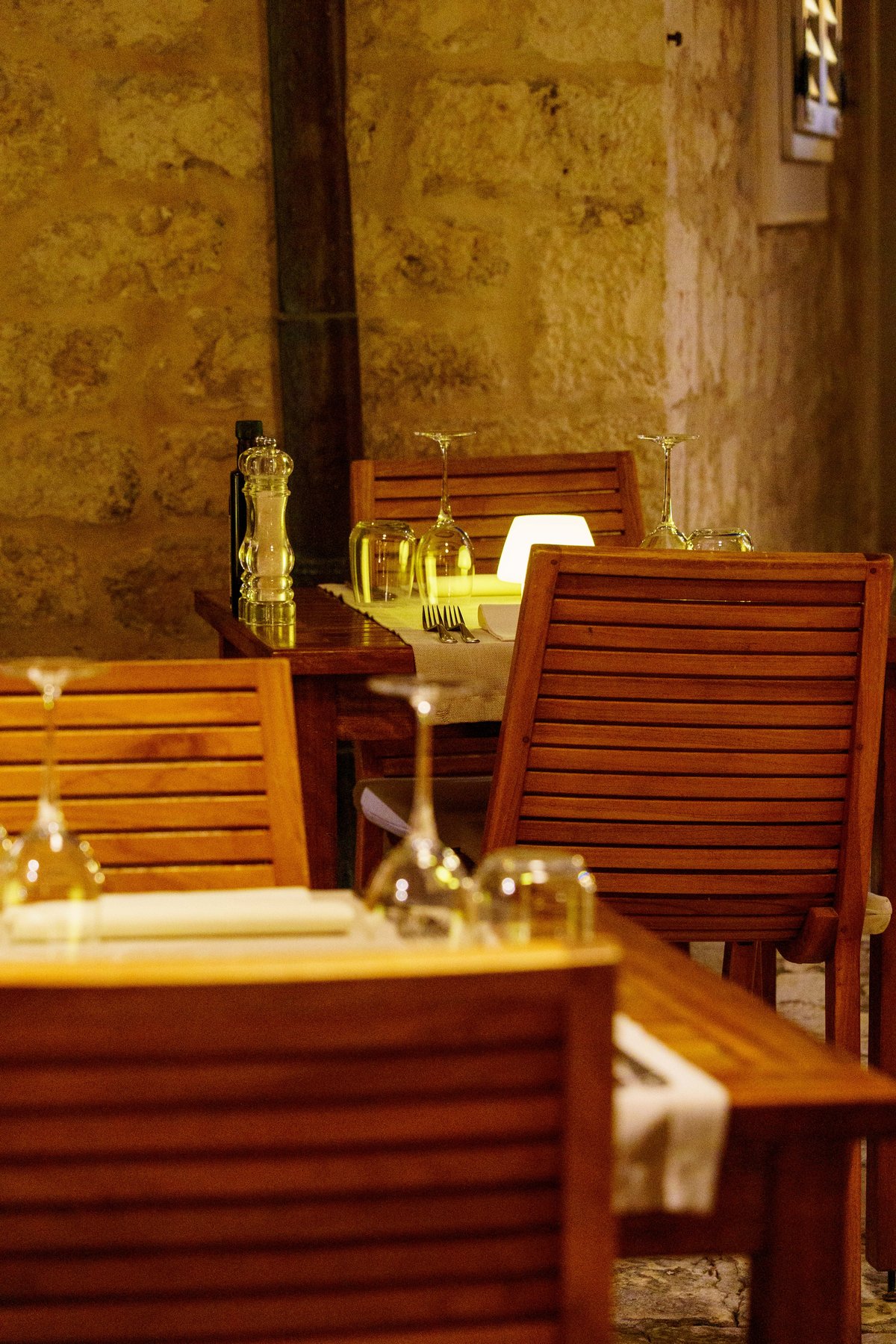 Candlelit dinner table set at Giaxa restaurant in Hvar