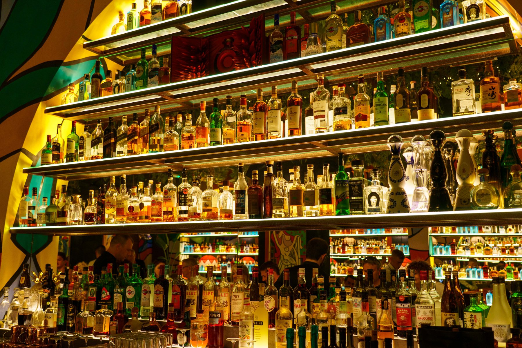Bottles lining the bar at Picasso Pizza and Bar in Split