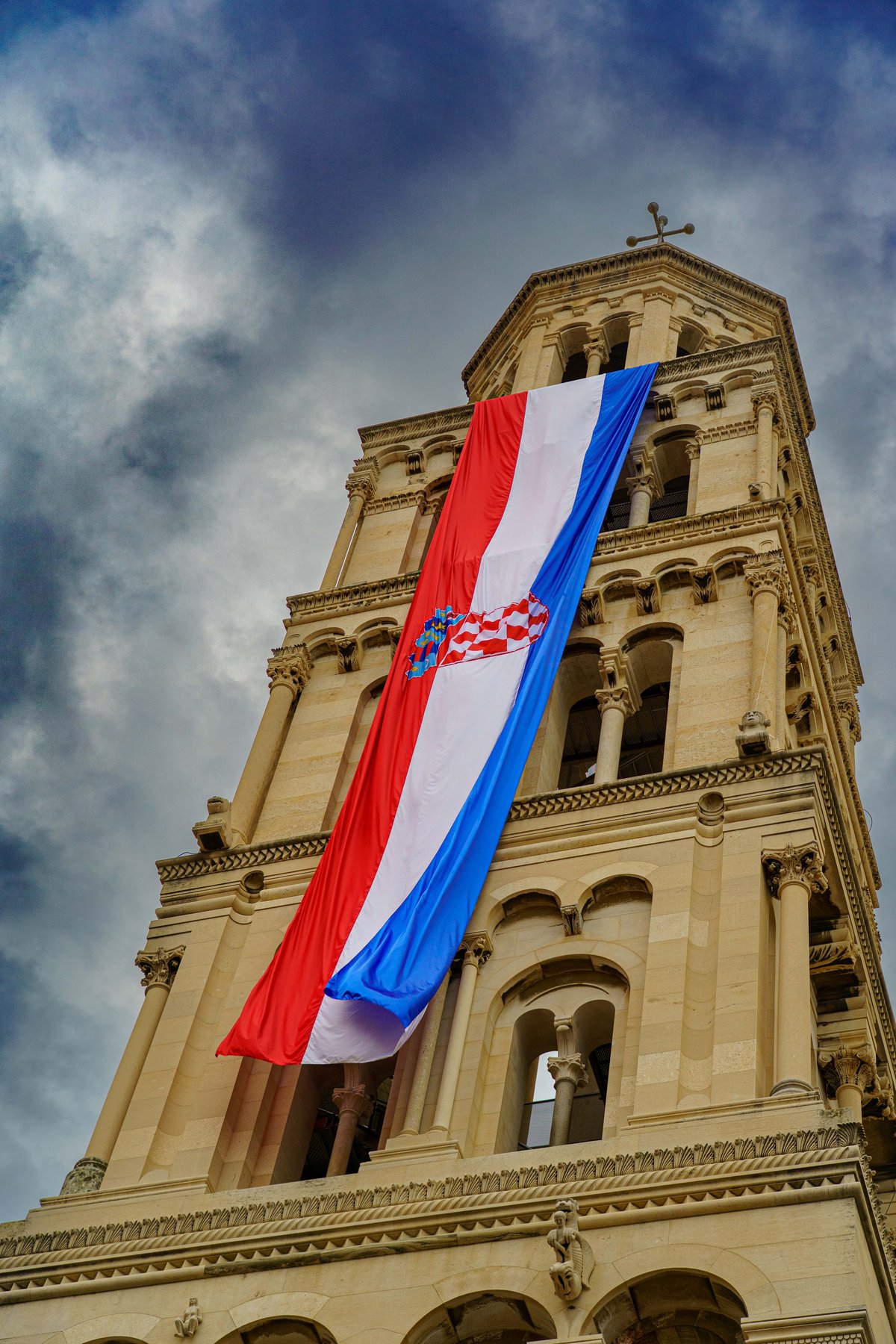 Croatian flag hanging from the St. Domnius Cathedral bell tower