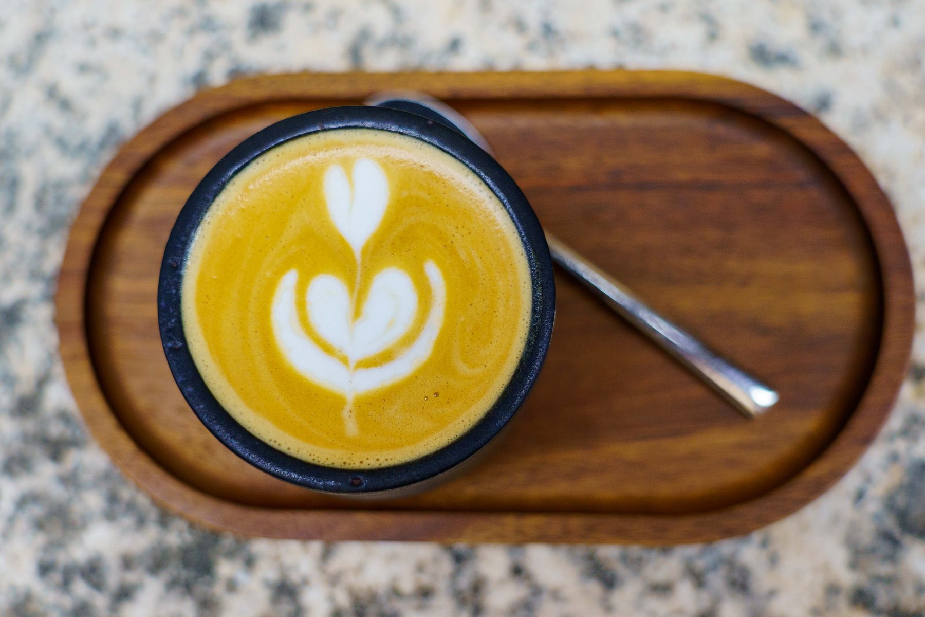 Latte art in a cup at CHI Specialty Coffee Roasters in Trogir