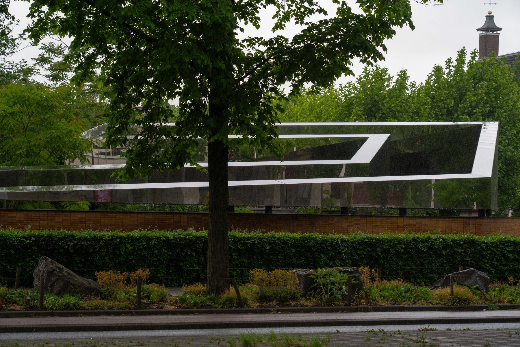 The mirrored stainless steel atop the National Holocaust Names Memorial