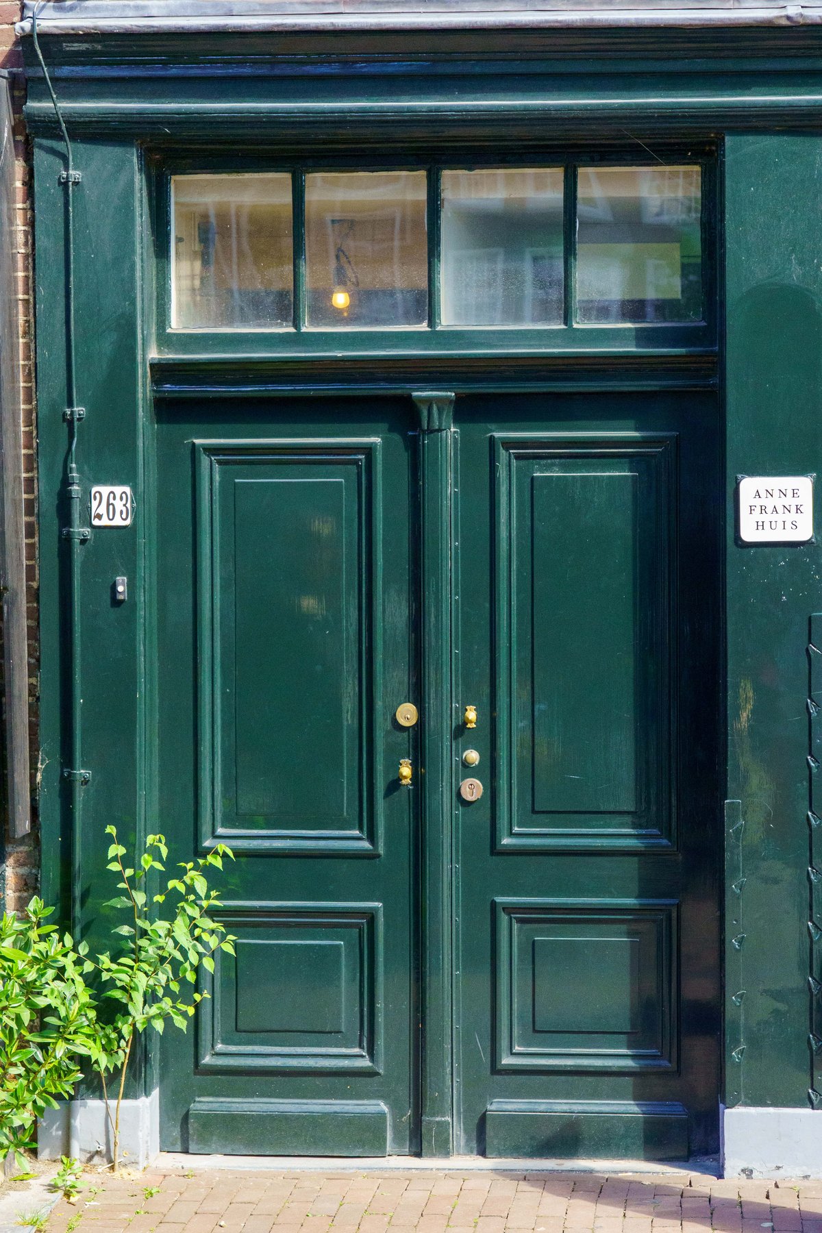 The green doors of the Anne Frank House on the Prinsengracht