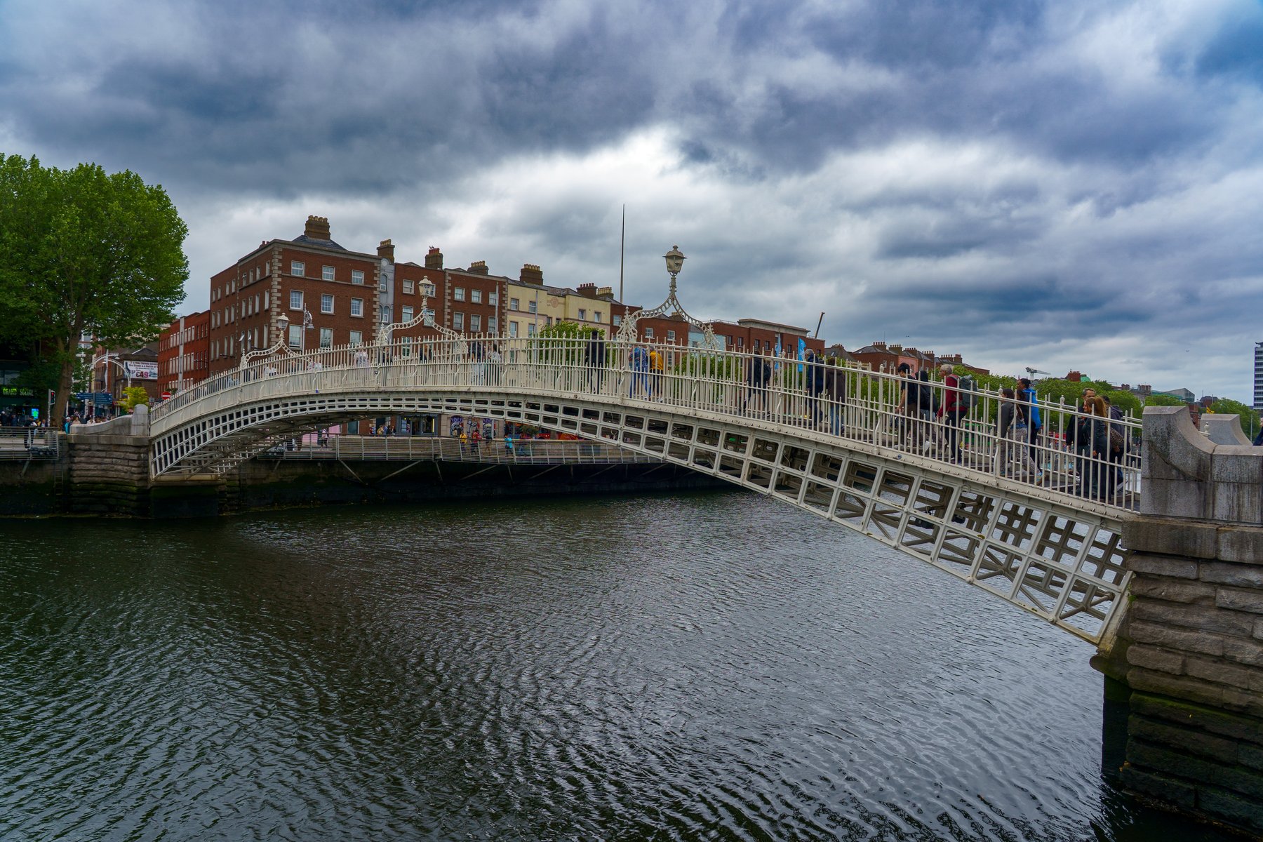The Ha'penny Bridge crossing the River Liffey in Dublin