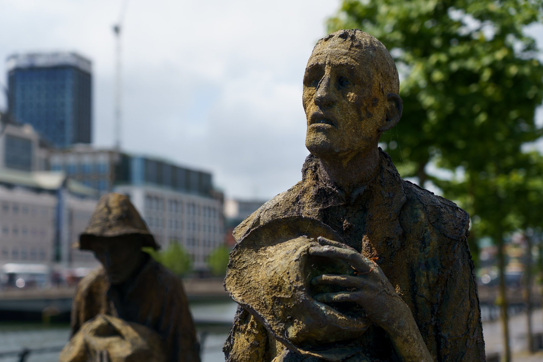 Bronze Famine Memorial statues along the Liffey quays in Dublin