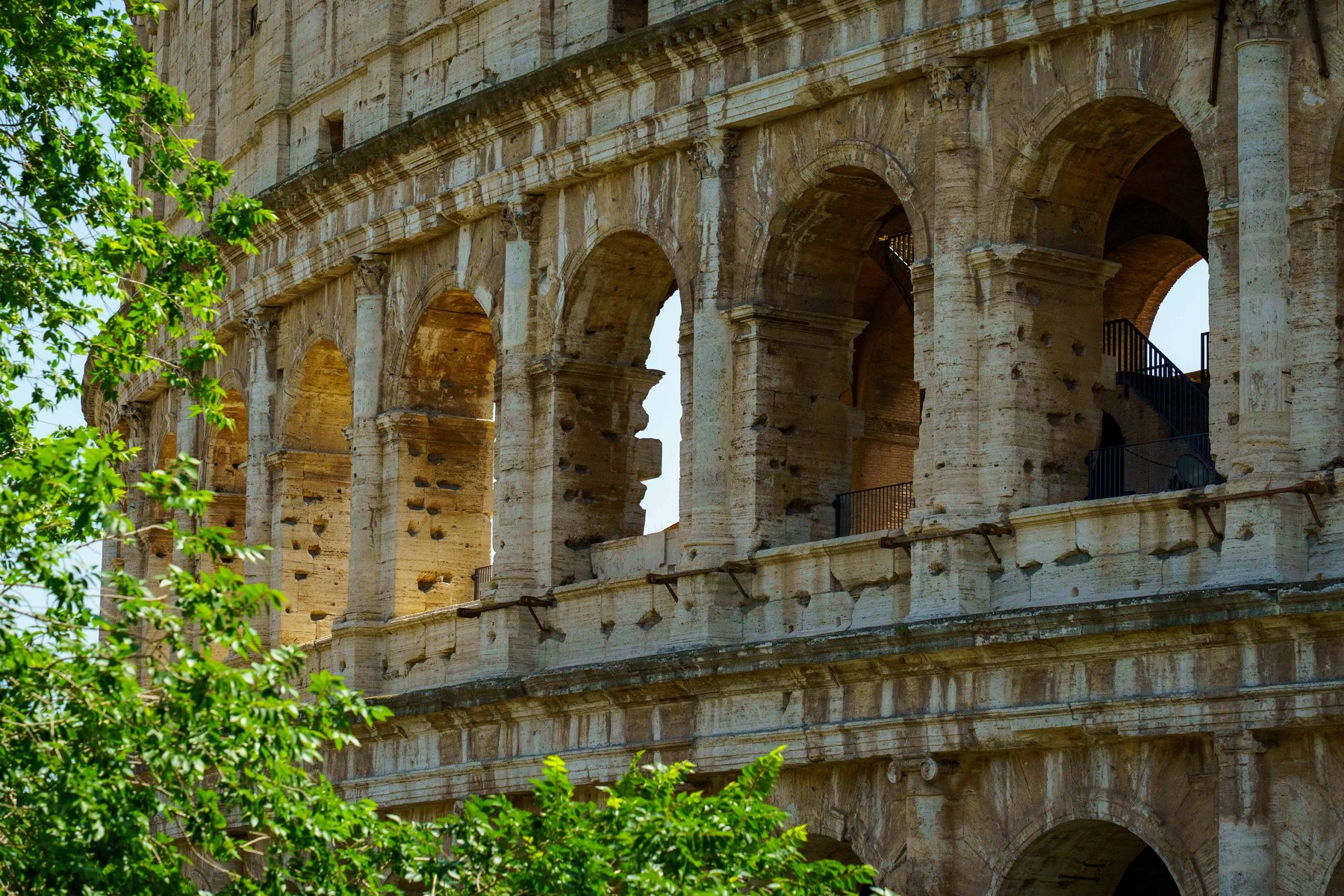 A close-up of the Colosseum's arched exterior