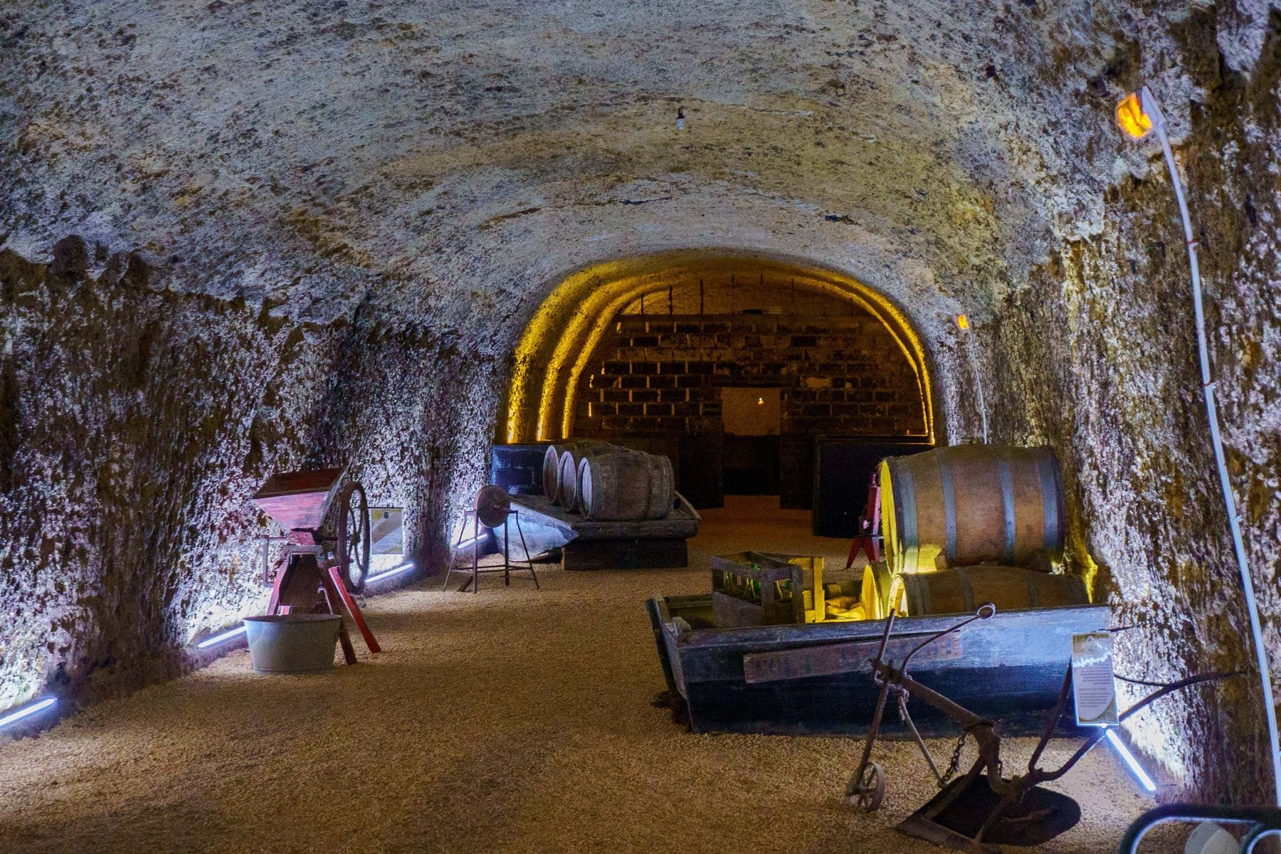 Antique winemaking equipment in the troglodyte cellars of the Maison des Vins d'Amboise