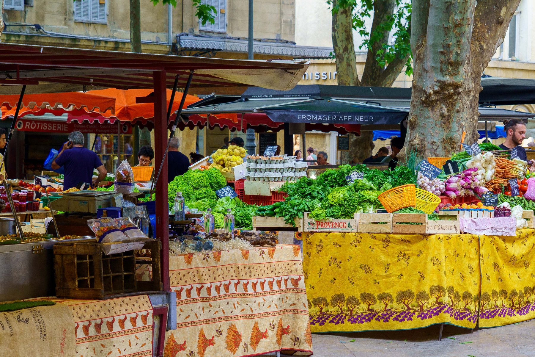 A Provencal market stall piled with vegetables in Aix-en-Provence