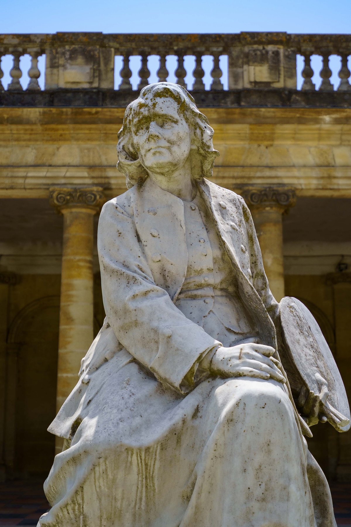One of the allegorical Genius statues at the entrance to the Palais Rohan in Bordeaux