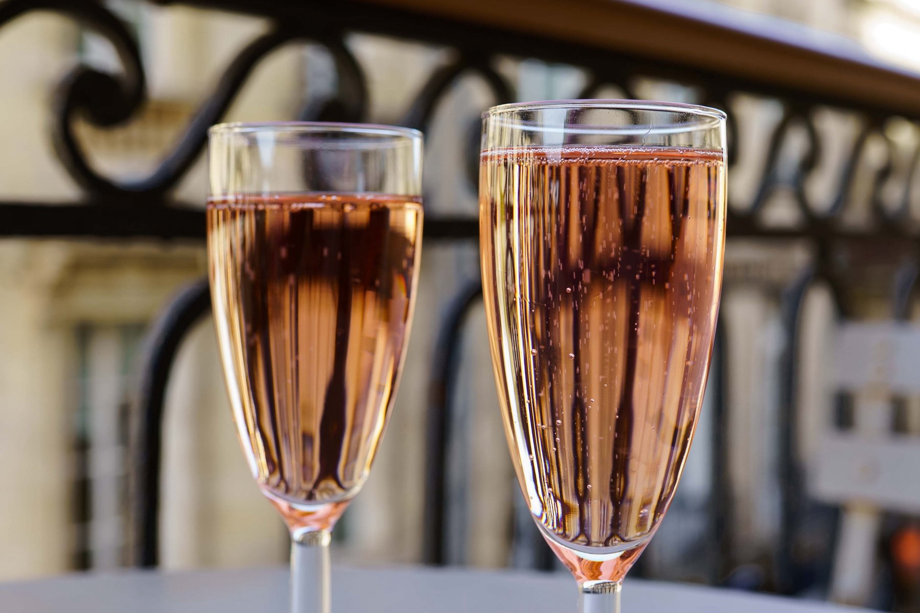 Two glasses of rose poured out on a balcony in Bordeaux, France