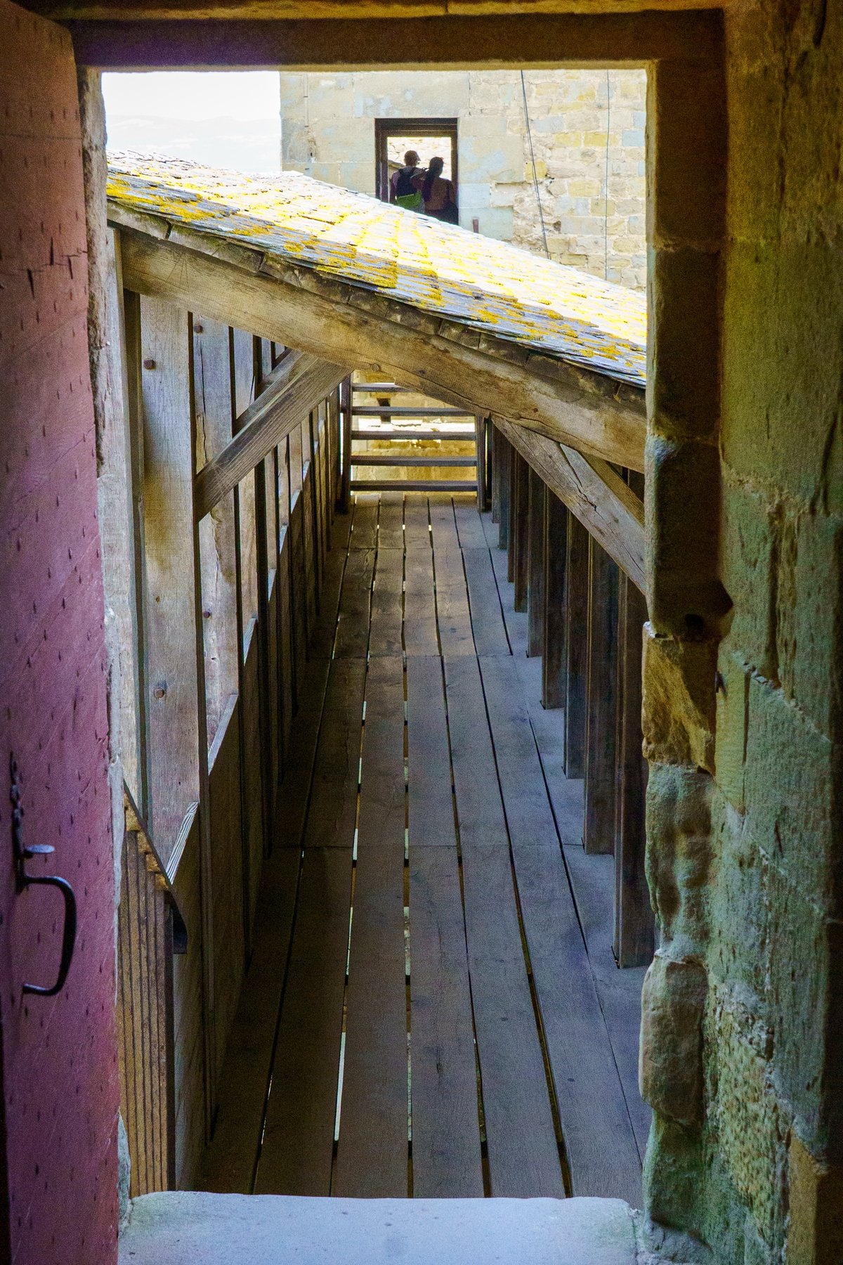 A wooden covered rampart walkway along the fortified walls of the Cite de Carcassonne