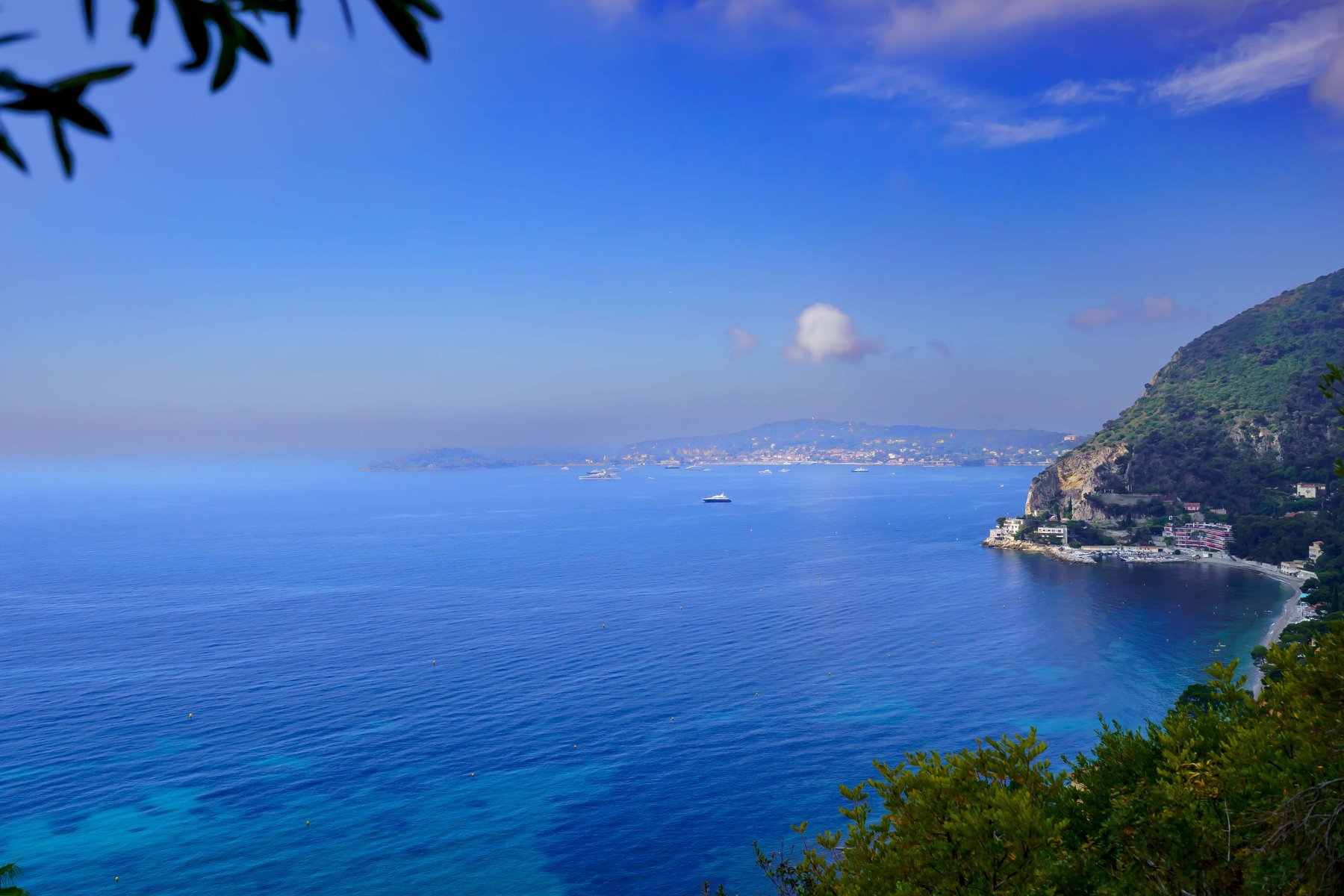 The rocky coastline below Eze, boats anchored offshore