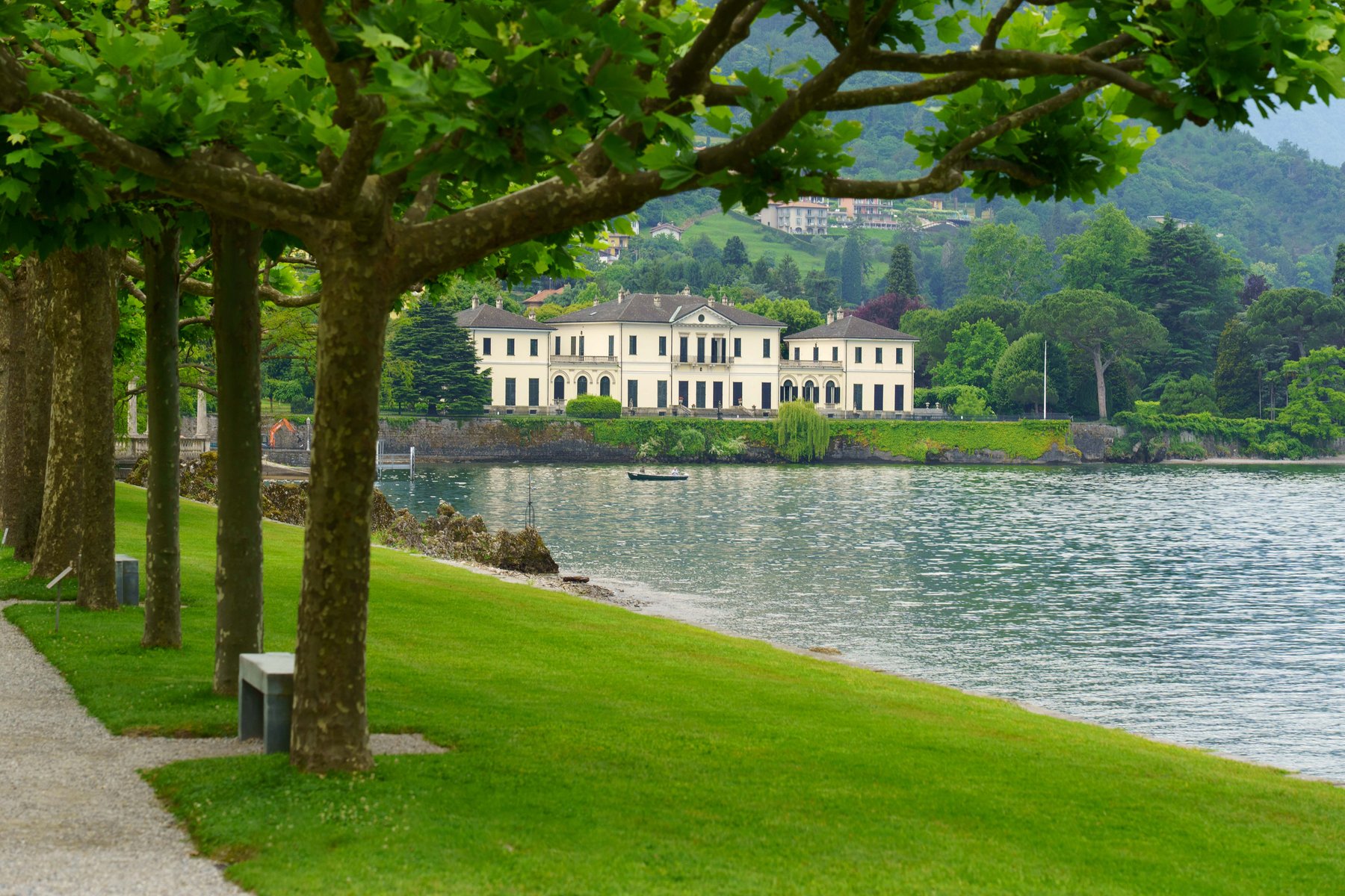 Villa Melzi d'Eril framed by a row of plane trees in Bellagio