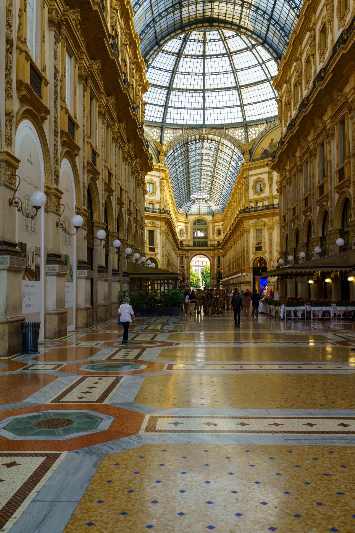 The glass domed interior of the Galleria Vittorio Emanuele II in Milan by day