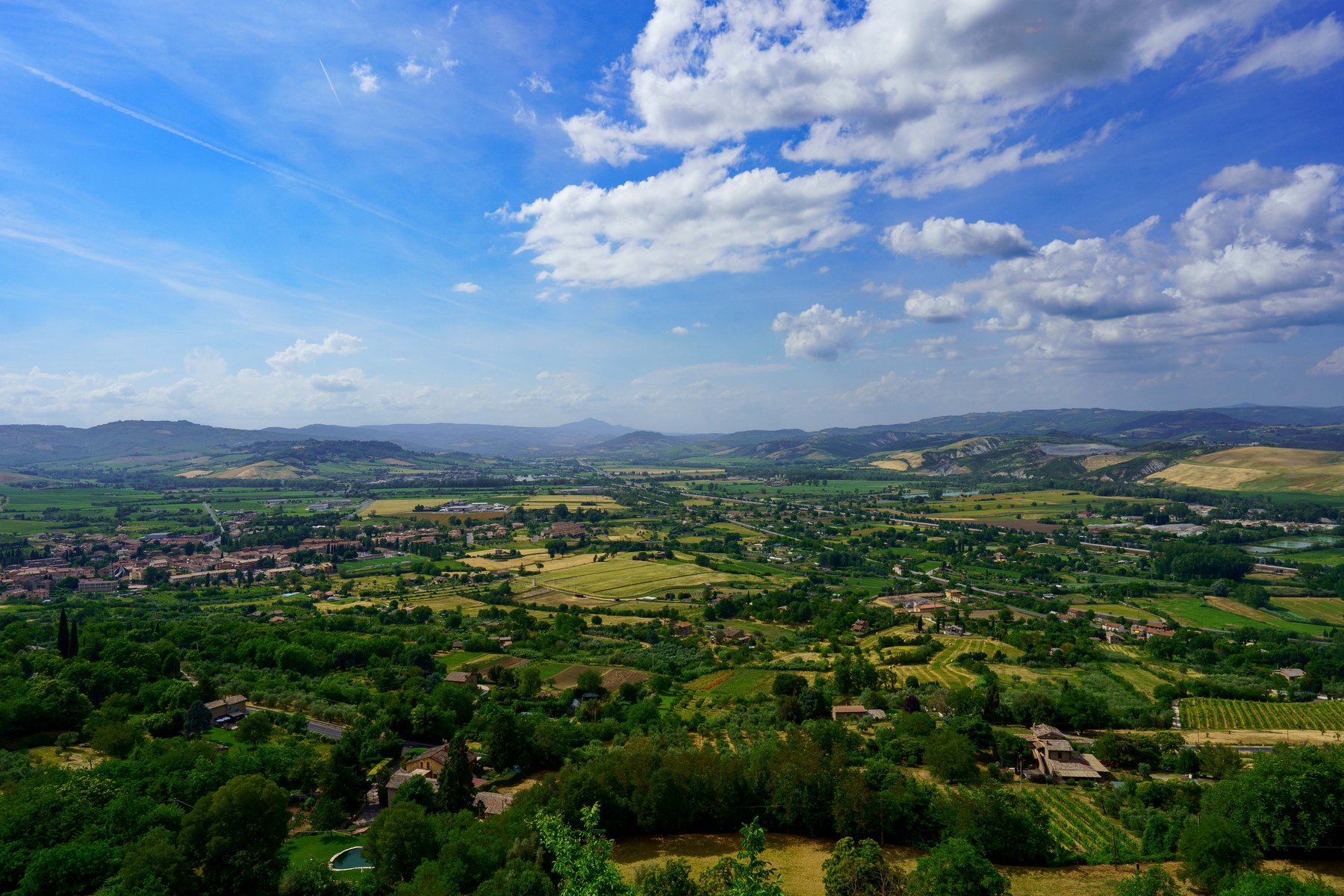 A wide panorama of the Umbrian countryside from the cliff's edge in Orvieto