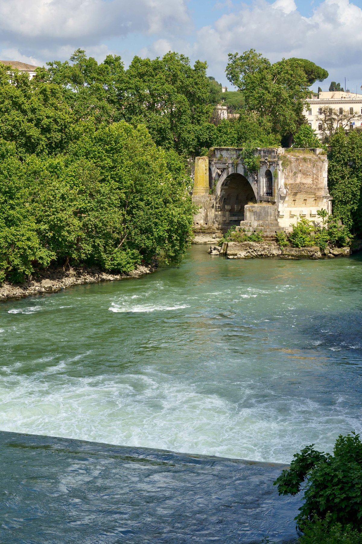 Ponte Rotto, the broken remains of ancient Rome's oldest stone bridge, in the Tiber River