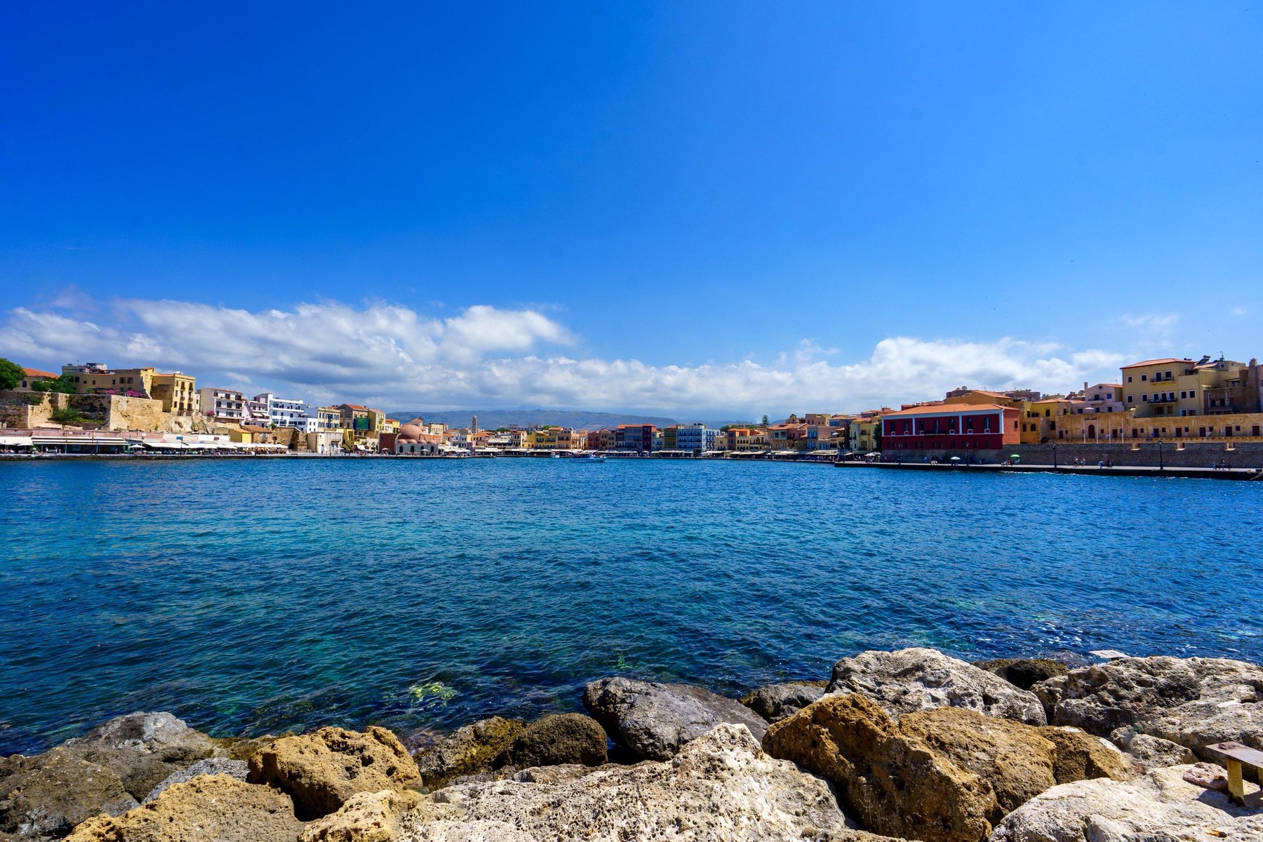 Chania's Venetian harbor lined with pastel-colored buildings