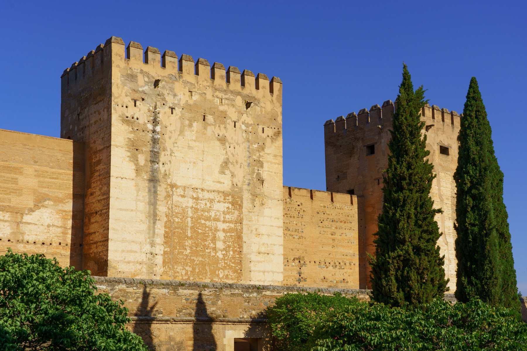 The crenellated fortress towers of the Alhambra's Alcazaba