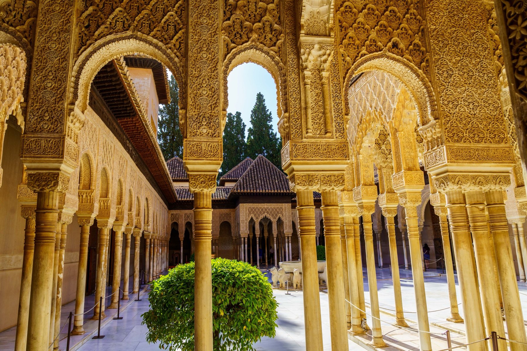 The carved marble colonnade surrounding the Court of the Lions