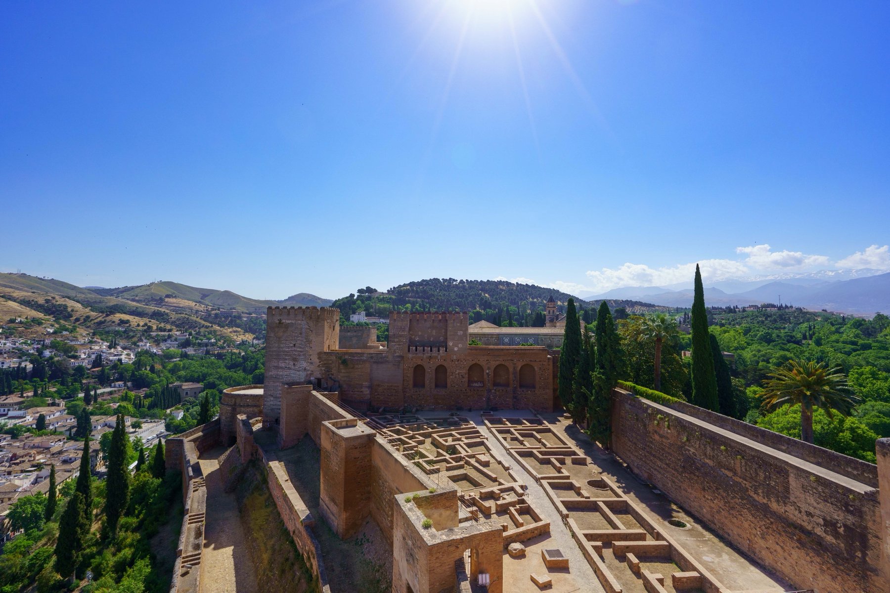 The Alcazaba's ruined foundations overlooking Granada and the Sierra Nevada mountains