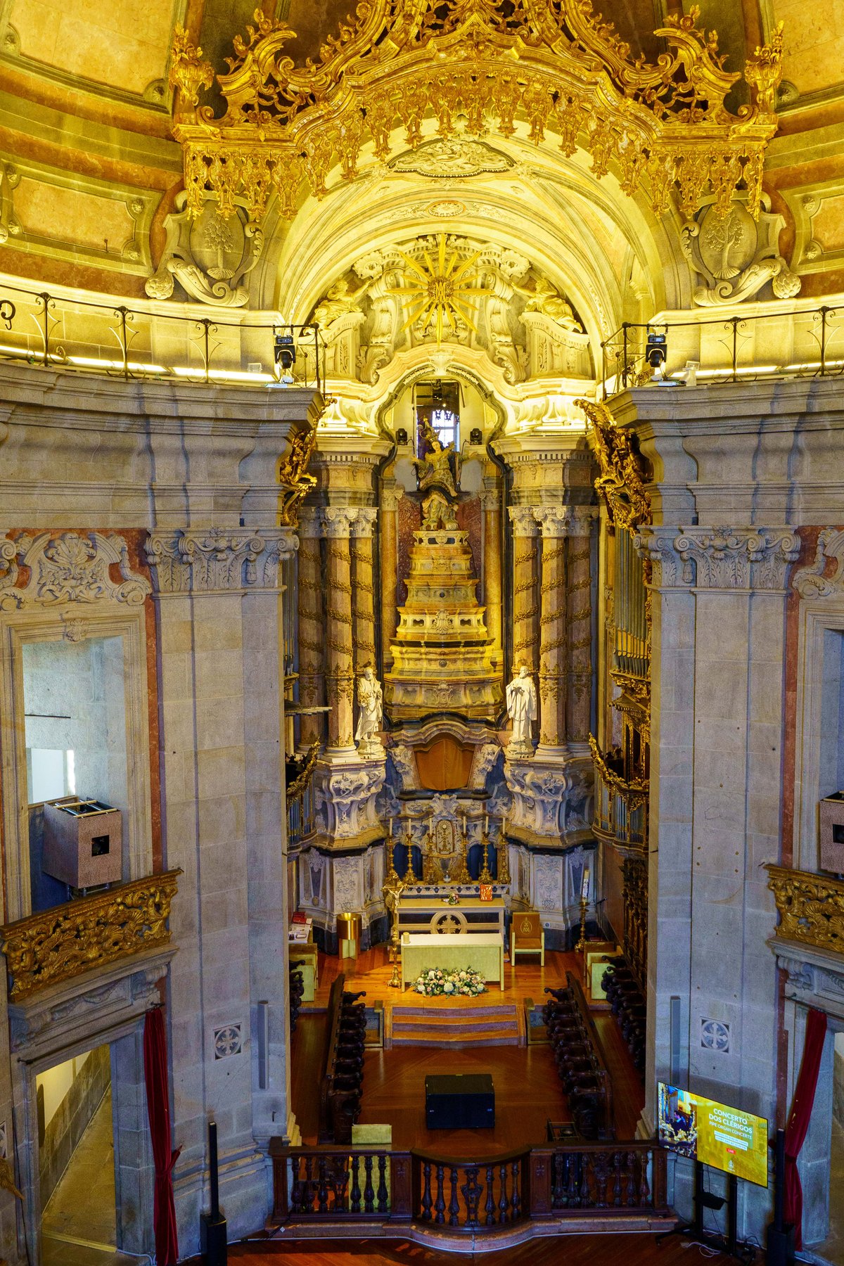The gilded Baroque altar and organ pipes inside Igreja dos Clérigos
