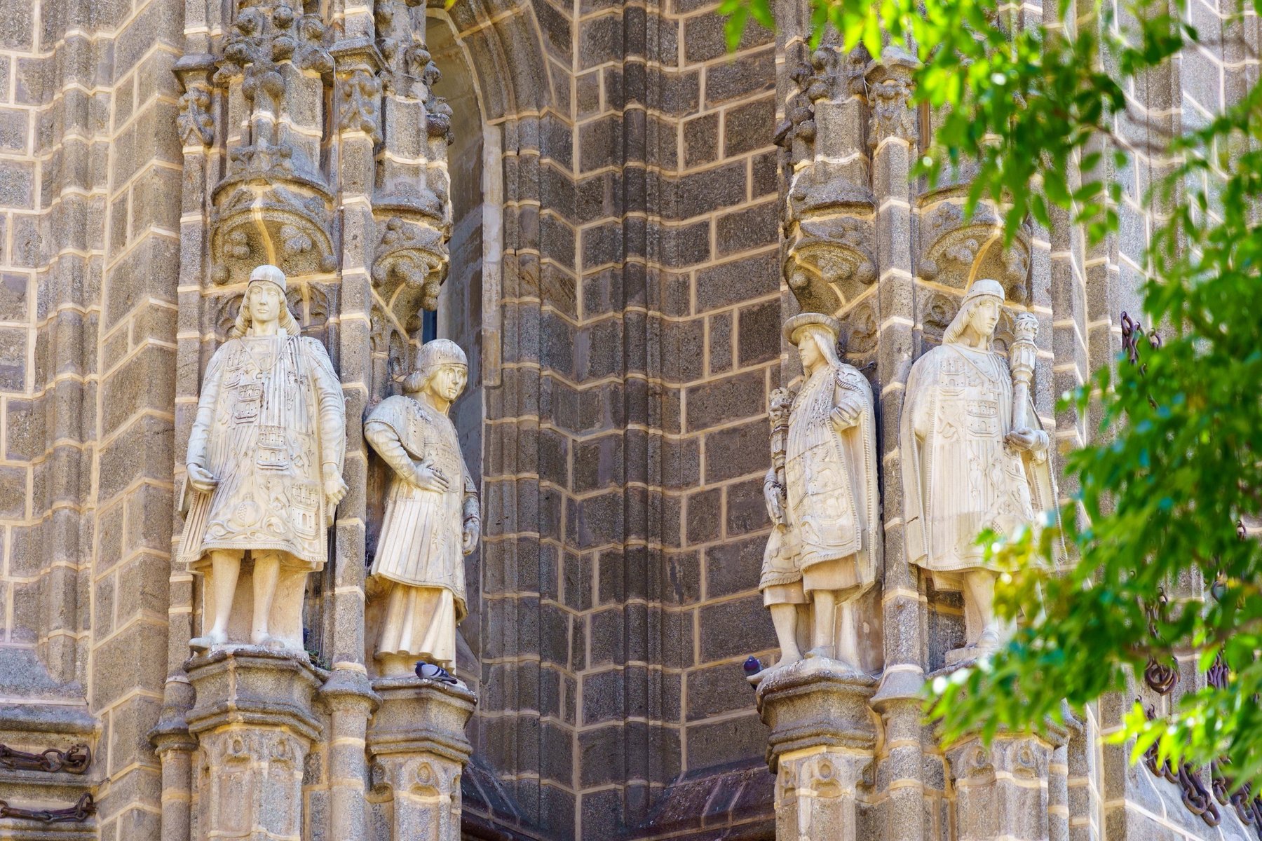 Carved statues of kings standing in niches on the Cathedral's facade